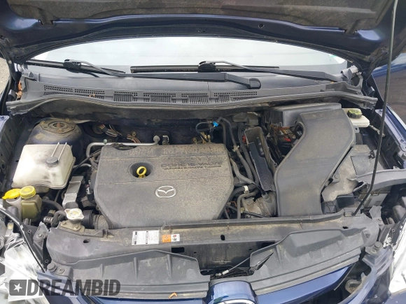 2010 Mazda 5 Sport with VIN JM1CR2W31A0364476, listed as a IAAI auction lot 42220961 with 177,885 mi miles and . Bid and sale history available at DreamBid. Image 10.