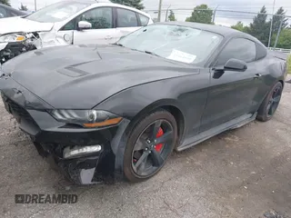 2021 Ford Mustang EcoBoost z VIN 1FA6P8TH7M5132841, wystawiony jako IAAI lot #42364830 z przebiegiem 22 331 mil mil oraz . Historia ofert i sprzedaży dostępna na DreamBid. Obrazek 17.