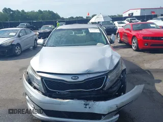 2015 Kia Optima LX with VIN 5XXGM4A75FG378795, listed as a IAAI auction lot 42604014 with 57,199 mi miles and . Bid and sale history available at DreamBid. Image 12.