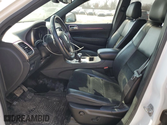 2014 Jeep Grand Cherokee Laredo with VIN 1C4RJFAG3EC580109, listed as a Copart auction lot 49155265 with 100,128 mi miles and Salvage Title. Bid and sale history available at carsss.com. Image 7.