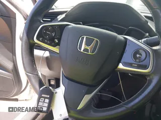 2018 Honda Civic EX-T z VIN JHMFC1F3XJX001723, wystawiony jako IAAI lot #42228776 z przebiegiem 97 432 mil mil oraz . Historia ofert i sprzedaży dostępna na DreamBid. Obrazek 11.