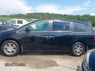 2011 Honda Odyssey EX-L with VIN 5FNRL5H69BB037248, listed as a IAAI auction lot 42613070 with 101,008 mi miles and . Bid and sale history available at DreamBid. Image 14.