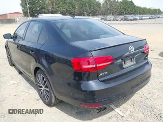 2015 Volkswagen Jetta SE z VIN 3VWD17AJ8FM403564, wystawiony jako IAAI lot #42016363 z przebiegiem 127 104 mil mil oraz . Historia ofert i sprzedaży dostępna na DreamBid. Obrazek 3.