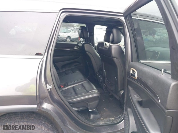 2014 Jeep Grand Cherokee Limited with VIN 1C4RJFBG8EC172946, listed as a IAAI auction lot 42048712 with 157,150 mi miles. Bid and sale history available at carsss.com. Image 8.
