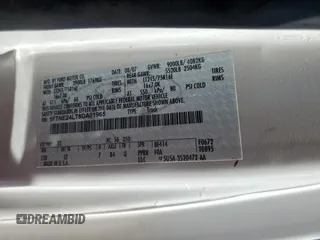 2008 Ford Econoline Cargo Commercial с VIN 1FTNE24L78DA01965, выставлен на аукционе Copart как лот 67921874 с пробегом 237 535 миль миль и Списание • Salvage title. История ставок и продаж доступна на DreamBid. Изображение 13.
