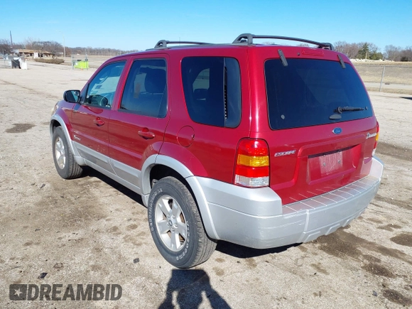 2005 Ford Escape Hybrid with VIN 1FMYU96H05KE01130, listed as a IAAI auction lot 41711338 with 288,964 mi miles. Bid and sale history available at carsss.com. Image 3.