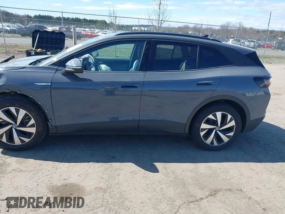 2023 Volkswagen ID.4 Pro with VIN 1V2CMPE89PC013880, listed as a IAAI auction lot 41801156 with 18,098 mi miles and . Bid and sale history available at DreamBid. Image 14.