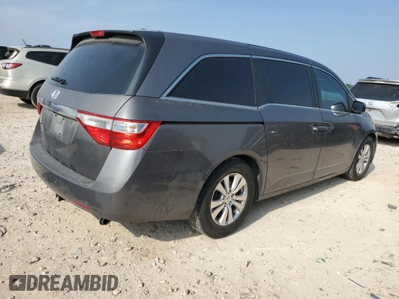 2011 Honda Odyssey EX-L with VIN 5FNRL5H64BB082596, listed as a Copart auction lot 51474935 with 184,408 mi miles and Salvage Title. Bid and sale history available at DreamBid. Image 3.