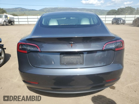 2022 Tesla Model 3 with VIN 5YJ3E1EA4NF244376, listed as a Copart auction lot 52142855 with Not Provided miles and Salvage Title. Bid and sale history available at DreamBid. Image 6.