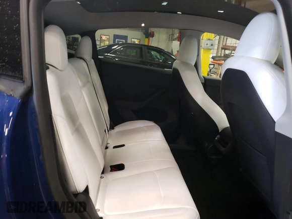 2023 Tesla Model Y Long Range with VIN 7SAYGDEE7PA180793, listed as a Copart auction lot 46706855 with 18,136 mi miles and Non Repairable. Bid and sale history available at DreamBid. Image 11.