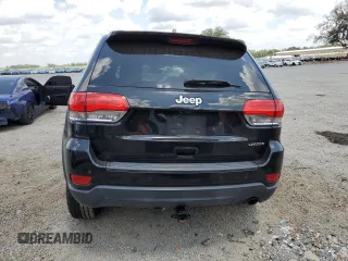 2018 Jeep Grand Cherokee Laredo E with VIN 1C4RJEAG1JC354221, listed as a Copart auction lot 58002715 with 108,223 mi miles and Salvage title. Bid and sale history available at DreamBid. Image 6.