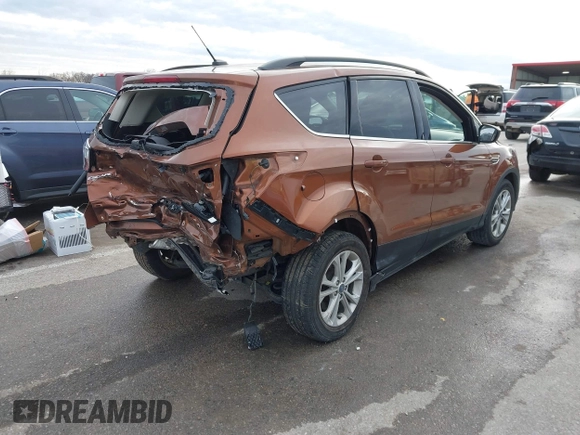 2017 Ford Escape SE with VIN 1FMCU0GD5HUE08097, listed as a IAAI auction lot 41499800 with 70,911 mi miles. Bid and sale history available at carsss.com. Image 4.