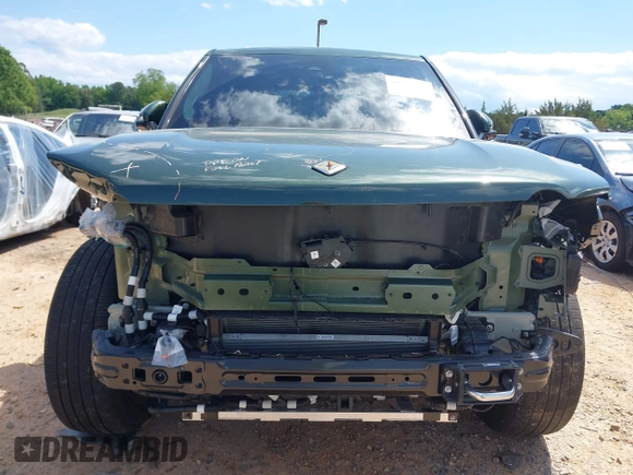 2023 Rivian R1T Adventure z VIN 7FCTGAAAXPN019894, wystawiony jako IAAI lot #42168226 z przebiegiem 23 380 mil mil oraz . Historia ofert i sprzedaży dostępna na DreamBid. Obrazek 13.