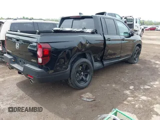 2023 Honda Ridgeline Black Edition with VIN 5FPYK3F83PB023481, listed as a IAAI auction lot 42157928 with 24,632 mi miles and . Bid and sale history available at DreamBid. Image 4.