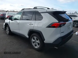 2019 Toyota RAV4 XLE with VIN 2T3W1RFV5KW051023, listed as a IAAI auction lot 40970612 with 106,359 mi miles and . Bid and sale history available at DreamBid. Image 3.