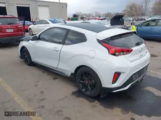 2019 Hyundai Veloster Turbo with VIN KMHTH6AB3KU020193, listed as a IAAI auction lot 41526722 with 54,697 mi miles. Bid and sale history available at carsss.com. Image 3.