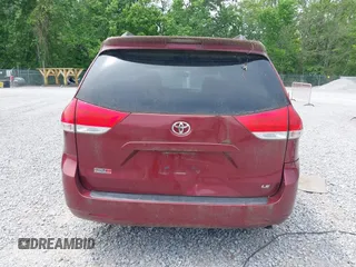 2011 Toyota Sienna LE AAS with VIN 5TDKK3DC2BS003748, listed as a IAAI auction lot 42142090 with 246,737 mi miles. Bid and sale history available at carsss.com. Image 16.