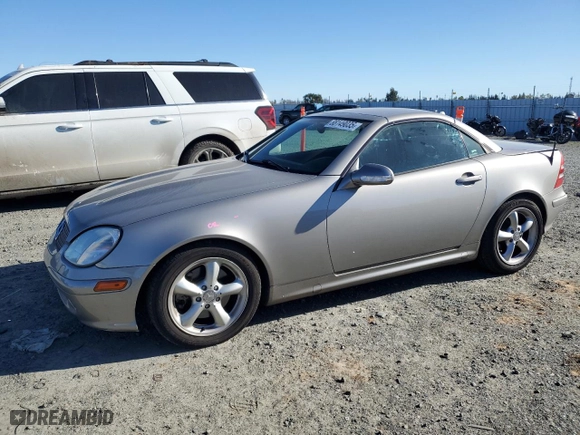 2003 Mercedes-Benz SLK-Class 3.2L with VIN WDBKK65F23F291880, listed as a Copart auction lot 88149035 with 104,527 mi miles and Salvage Title. Bid and sale history available at carsss.com. Image 1.