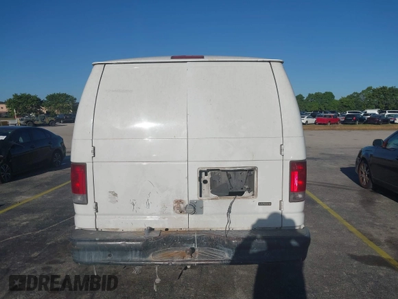 2011 Ford Econoline Cargo Commercial with VIN 1FTNE2EW8BDA84595, listed as a IAAI auction lot 41795228 with 316,856 mi miles. Bid and sale history available at carsss.com. Image 6.