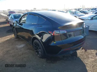 2023 Tesla Model Y Long Range with VIN 7SAYGDEE0PF907260, listed as a IAAI auction lot 41180227 with Not Provided miles and . Bid and sale history available at DreamBid. Image 3.