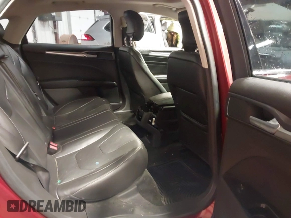 2014 Ford Fusion Titanium with VIN 3FA6P0K97ER324027, listed as a IAAI auction lot 41327141 with 161,045 mi miles and . Bid and sale history available at DreamBid. Image 8.