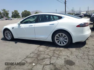 2017 Tesla Model S 60 with VIN 5YJSA1E16HF198903, listed as a Copart auction lot 60601565 with Not provided miles and Clean title. Bid and sale history available at DreamBid. Image 2.