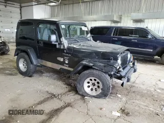 2002 Jeep Wrangler Sport with VIN 1J4FA49S62P713475, listed as a Copart auction lot 59299965 with 114,654 mi miles and Non repairable. Bid and sale history available at DreamBid. Image 4.