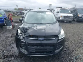 2015 Ford Escape SE with VIN 1FMCU9G98FUA26059, listed as a IAAI auction lot 41991222 with 149,298 mi miles and . Bid and sale history available at DreamBid. Image 13.