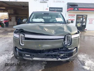 2024 Rivian R1S Launch Edition with VIN 7PDSGABL1RN035074, listed as a IAAI auction lot 41276556 with Not Provided miles. Bid and sale history available at carsss.com. Image 12.