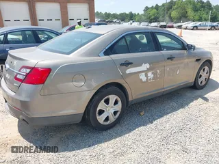 2014 Ford Police Interceptor with VIN 1FAHP2MK4EG131670, listed as a IAAI auction lot 42614498 with 110,254 mi miles and . Bid and sale history available at DreamBid. Image 4.