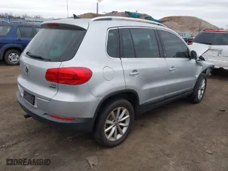 2017 Volkswagen Tiguan Wolfsburg Edition with VIN WVGSV7AX8HK031345, listed as a IAAI auction lot 41348567 with 130,313 mi miles. Bid and sale history available at carsss.com. Image 4.