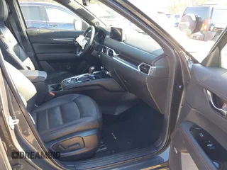 2022 Mazda CX-5 2.5 Turbo with VIN JM3KFBAY1N0526661, listed as a IAAI auction lot 41350659 with 22,963 mi miles and . Bid and sale history available at carsss.com. Image 5.