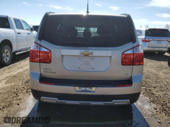 2012 Chevrolet Orlando 1LT z VIN KL77P2EM4CK576746, wystawiony jako Copart lot #54950285 z przebiegiem 183 399 mil mil oraz Szkody całkowita. Historia ofert i sprzedaży dostępna na DreamBid. Obrazek 6.