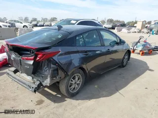 2021 Toyota Prius Prime LE with VIN JTDKAMFP9M3171321, listed as a IAAI auction lot 41464622 with NaN miles. Bid and sale history available at carsss.com. Image 4.