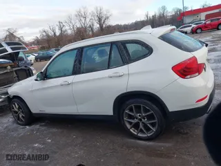 2013 BMW X1 28i with VIN WBAVM1C58DVW45962, listed as a IAAI auction lot 41323144 with 117,363 mi miles. Bid and sale history available at carsss.com. Image 14.