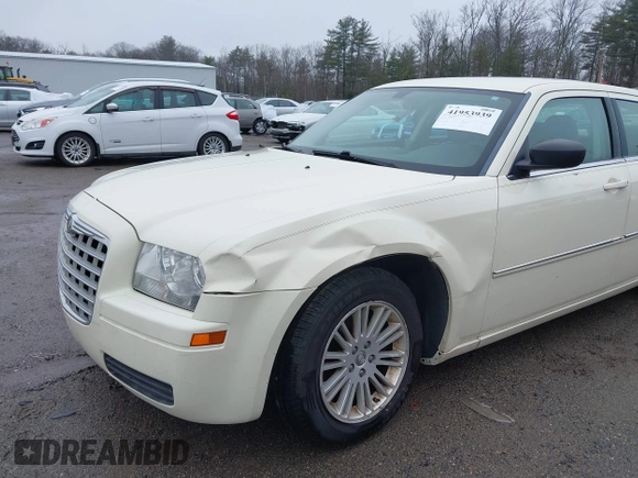 2009 Chrysler 300 LX z VIN 2C3KA43D19H619697, wystawiony jako IAAI lot #41953939 z przebiegiem 146 688 mil mil oraz . Historia ofert i sprzedaży dostępna na DreamBid. Obrazek 6.
