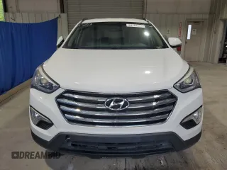 2016 Hyundai Santa Fe Premium z VIN KM8SNDHF6GU144631, wystawiony jako Copart lot #62164255 z przebiegiem 123 484 mil mil oraz Czysty tytuł • Clean title. Historia ofert i sprzedaży dostępna na DreamBid. Obrazek 5.