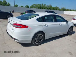 2018 Ford Fusion Titanium with VIN 3FA6P0RU3JR124007, listed as a IAAI auction lot 42207863 with 179,708 mi miles and . Bid and sale history available at DreamBid. Image 4.