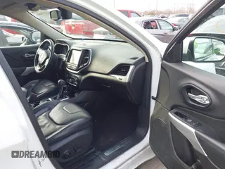 2018 Jeep Cherokee Overland with VIN 1C4PJMJX7JD594319, listed as a IAAI auction lot 41177860 with 128,925 mi miles. Bid and sale history available at carsss.com. Image 5.