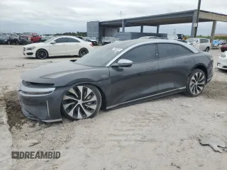 2023 Lucid Air Grand Touring z VIN 50EA1GBA8PA001431, wystawiony jako Copart lot #75683014 z przebiegiem 12 117 mil mil oraz Szkody całkowita. Historia ofert i sprzedaży dostępna na DreamBid. Obrazek 1.