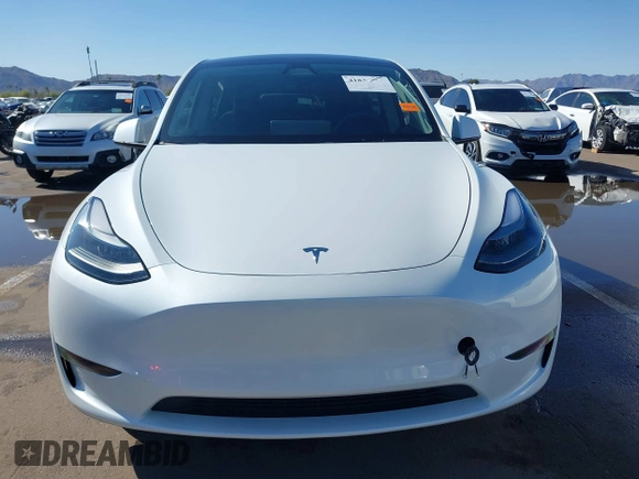 2024 Tesla Model Y Performance with VIN 7SAYGDEF4RF053711, listed as a IAAI auction lot 41836931 with 12,442 mi miles and . Bid and sale history available at DreamBid. Image 12.