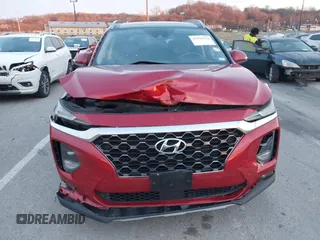 2019 Hyundai Santa Fe Ultimate with VIN 5NMS5CAA4KH105145, listed as a IAAI auction lot 41156214 with 54,796 mi miles and . Bid and sale history available at DreamBid. Image 13.