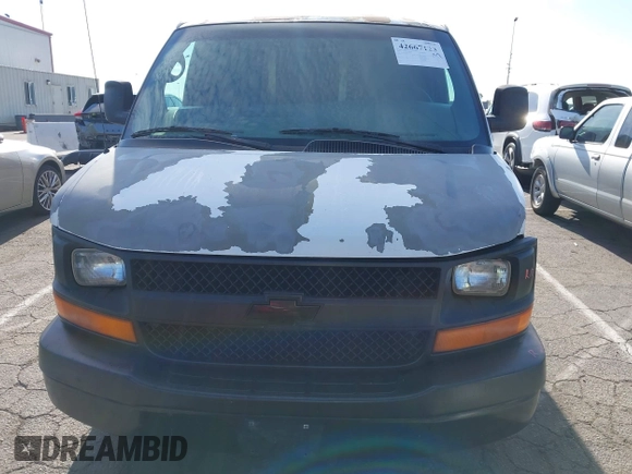 2004 Chevrolet Express Cargo z VIN 1GCFG15X241105110, wystawiony jako IAAI lot #42667123 z przebiegiem 143 147 mil mil oraz . Historia ofert i sprzedaży dostępna na DreamBid. Obrazek 12.