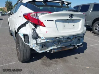 2021 Toyota C-HR LE with VIN JTNKHMBX0M1125868, listed as a IAAI auction lot 41633739 with 36,401 mi miles. Bid and sale history available at carsss.com. Image 6.