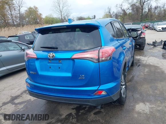 2018 Toyota RAV4 LE with VIN JTMBFREV8JJ220630, listed as a IAAI auction lot 42001795 with 86,027 mi miles. Bid and sale history available at carsss.com. Image 16.