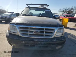 1999 Ford F-150 с VIN 2FTZX1729XCA25031, выставлен на аукционе Copart как лот 46941615 с пробегом 310 800 миль миль и Списание • Salvage title. История ставок и продаж доступна на DreamBid. Изображение 5.