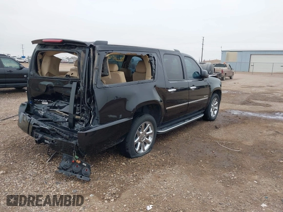 2014 GMC Yukon XL Denali with VIN 1GKS2MEF8ER239777, listed as a IAAI auction lot 41192009 with 142,656 mi miles. Bid and sale history available at carsss.com. Image 4.