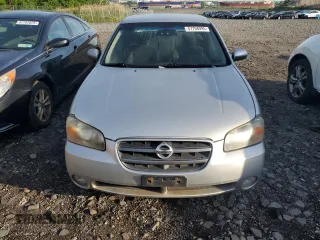 2003 Nissan Maxima SE z VIN JN1DA31D83T505047, wystawiony jako Copart lot #57708995 z przebiegiem 110 054 mil mil oraz Czysty tytuł • Clean title. Historia ofert i sprzedaży dostępna na DreamBid. Obrazek 5.