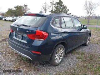 2015 BMW X1 xDrive28i with VIN WBAVL1C56FVY27567, listed as a IAAI auction lot 42047505 with 160,013 mi miles. Bid and sale history available at carsss.com. Image 4.