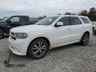 2013 Dodge Durango R/T with VIN 1C4SDHCT0DC648668, listed as a Copart auction lot 83211194 with 149,649 mi miles and Salvage title. Bid and sale history available at DreamBid. Image 1.